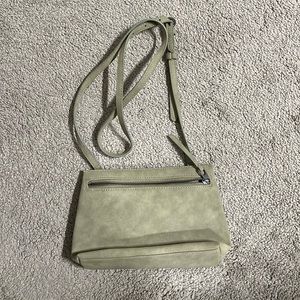 Light moss green crossbody bag.